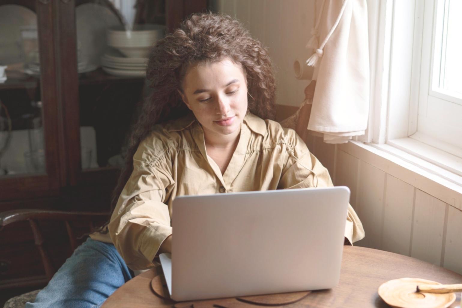 Team members reviewing digital banking security protocols in bright office environment